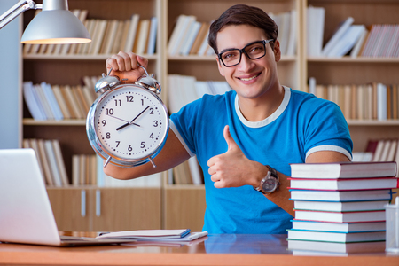 student holding clock concept for renewable scholarships