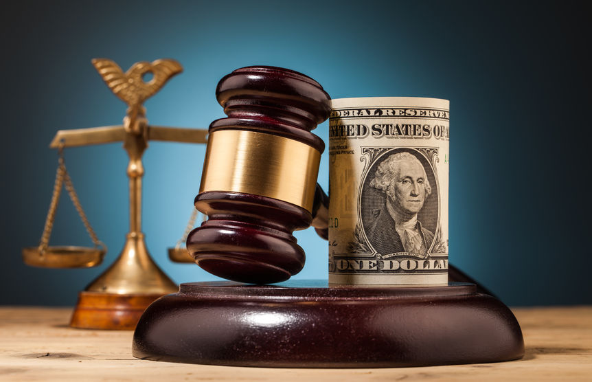 judge gavel and dollar money closeup on wooden table concept for law scholarships