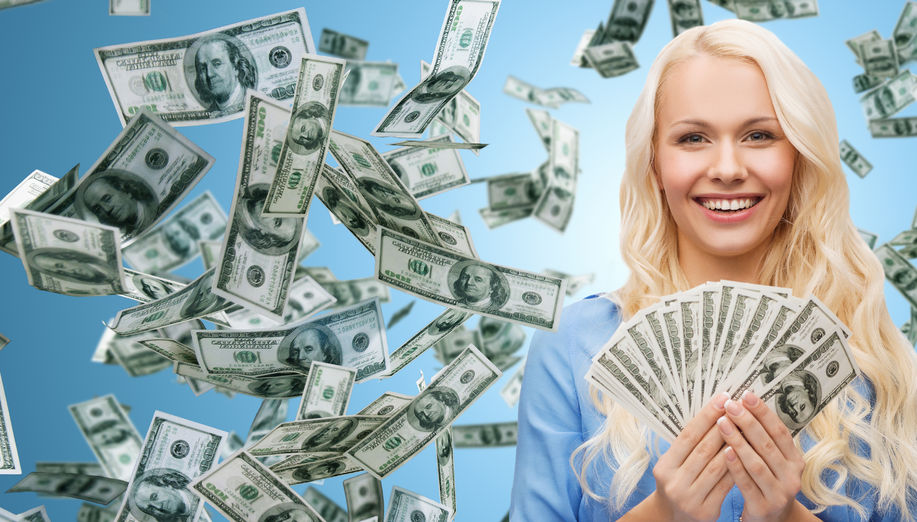 business, money, finance, people and banking concept - smiling businesswoman with dollar cash money over blue background concept for lottery scholarship