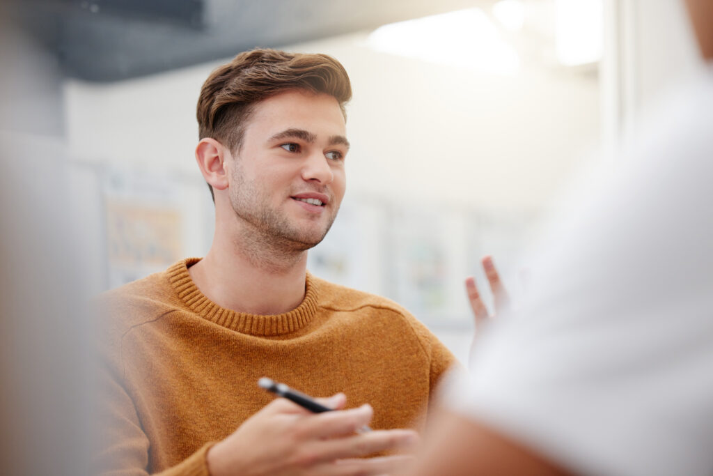 Leadership, mentor or student man presenter in workshop for education, learning or teaching in classroom. Collaboration, training or teamwork at school, college or university library for research