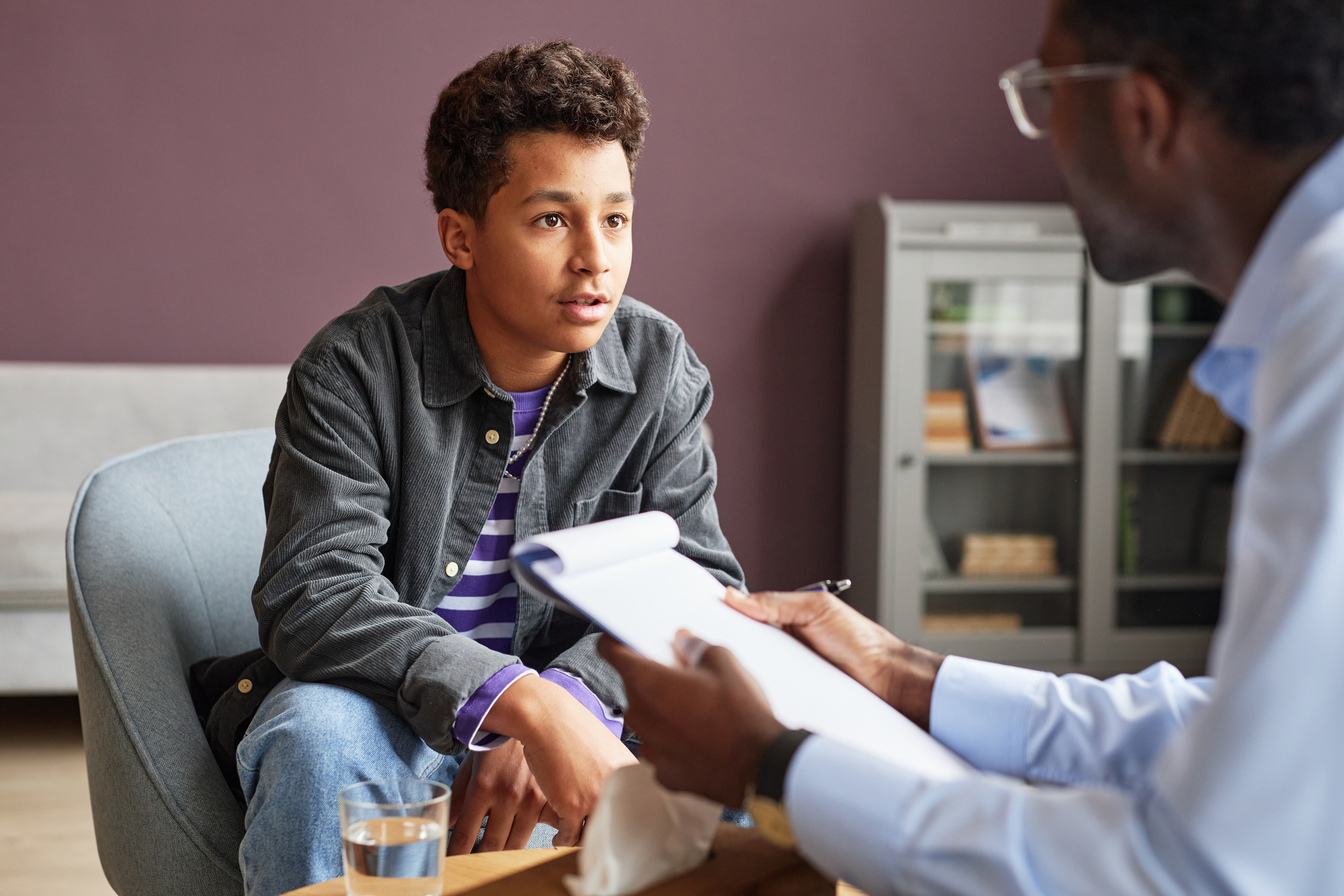 Teen Boy Talking to Psychologist