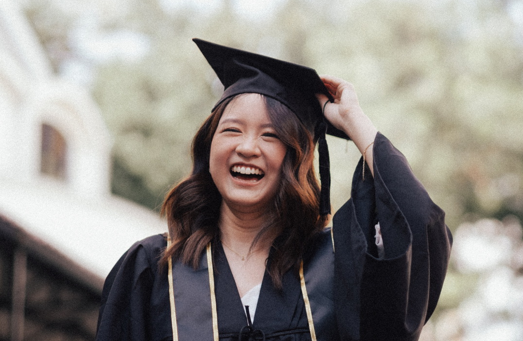 college graduate with cap and gown
