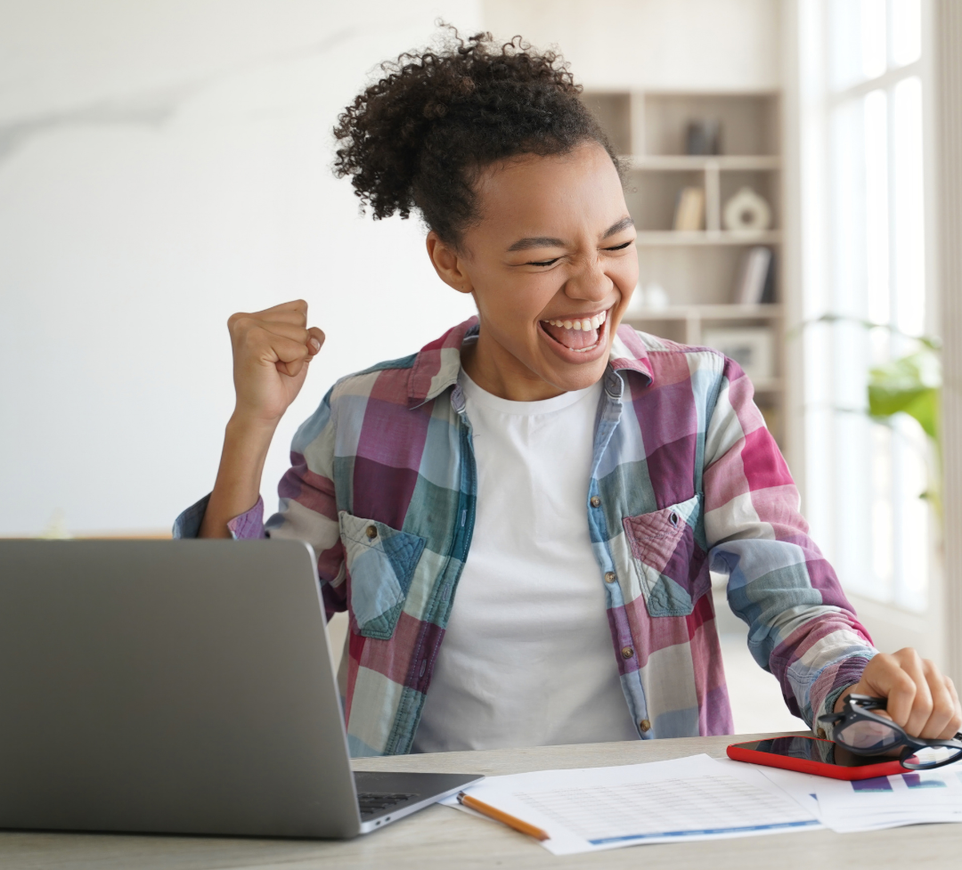 teen celebrating debt-free scholarship success
