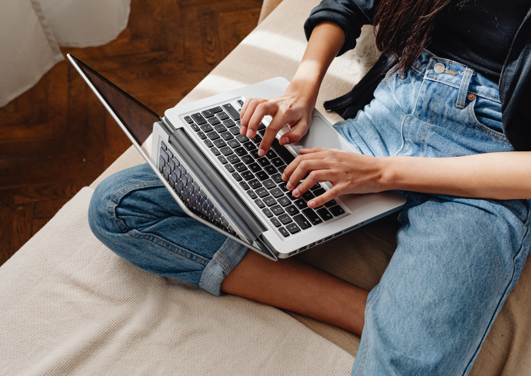 student typing college application