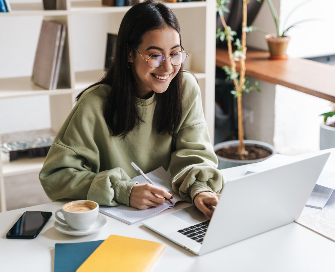 confident college student on laptop