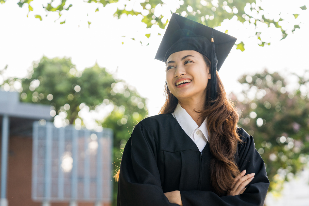 Confident college student thinking about her future