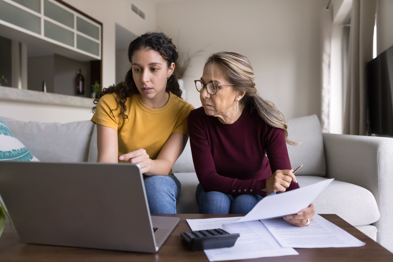 Concerned parent talks to college student about Parent PLUS Loans One Big Beautiful Bill Act