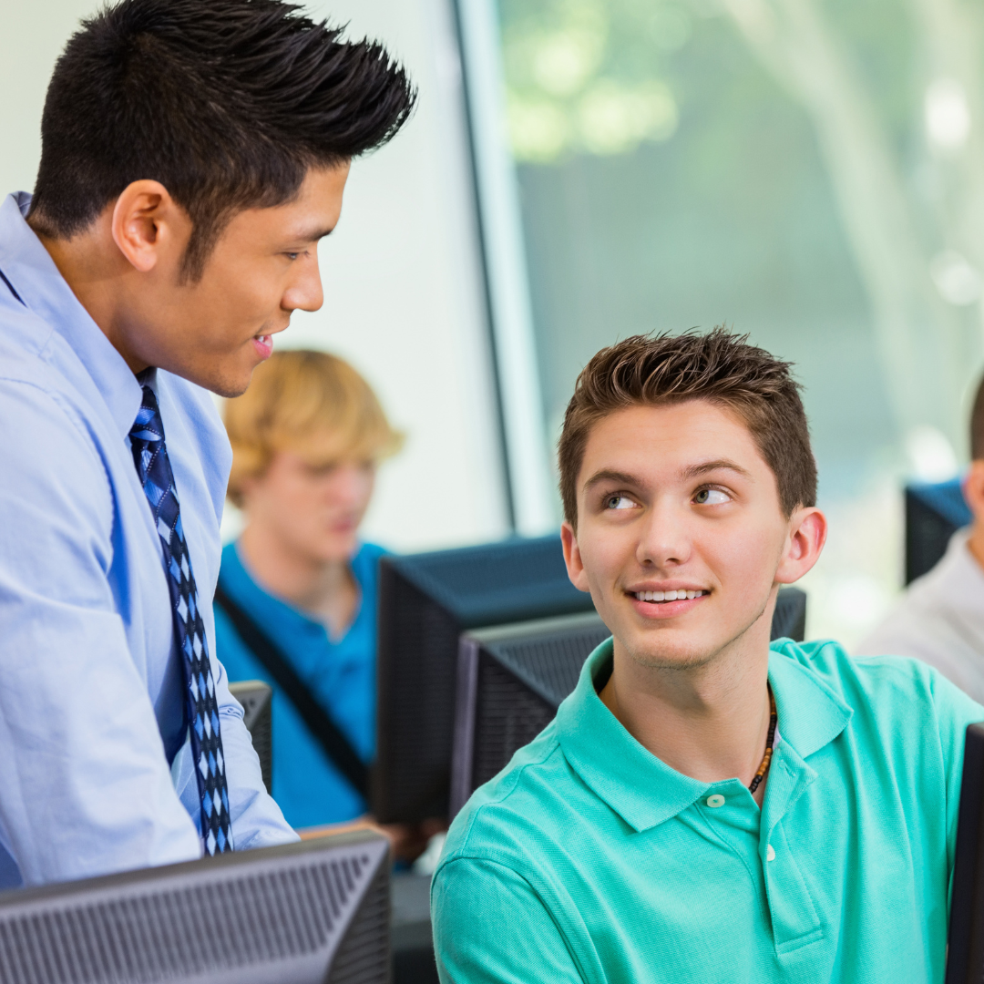 teacher talking with student about letter of recommendation